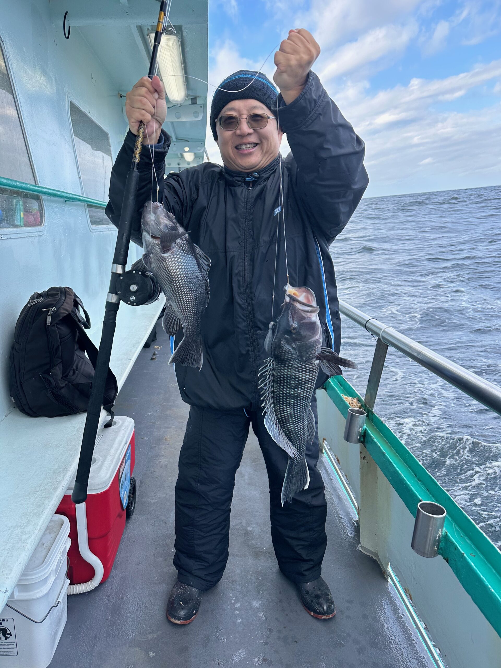 a couple of people that are standing in the water