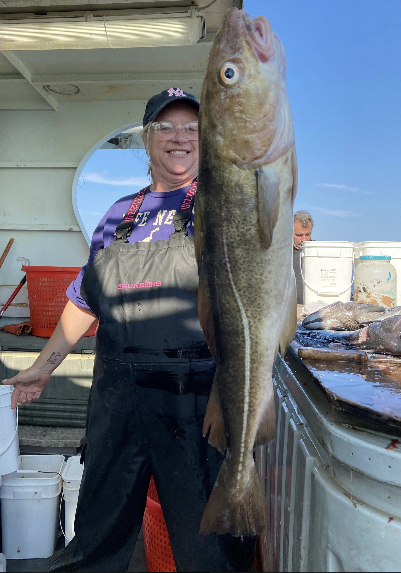 a person holding a fish