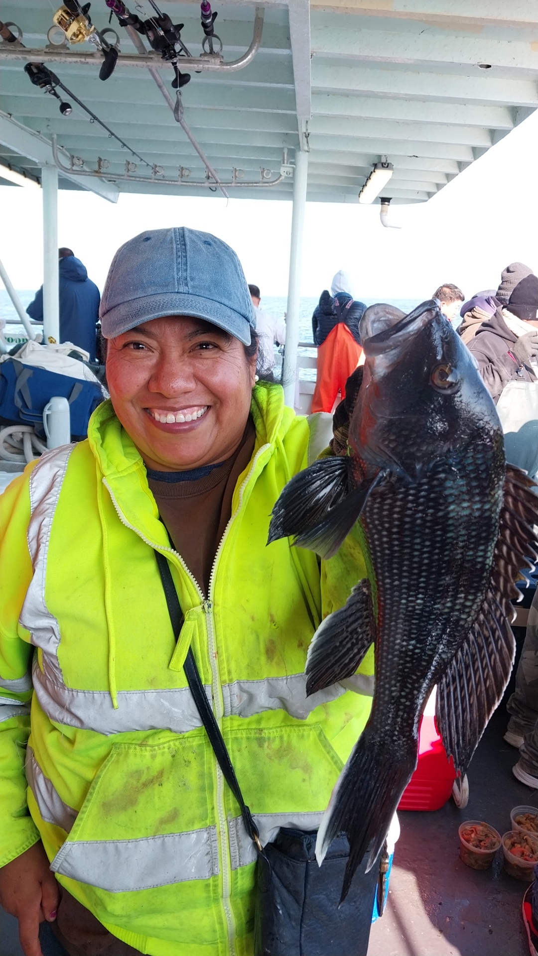 a person holding a fish