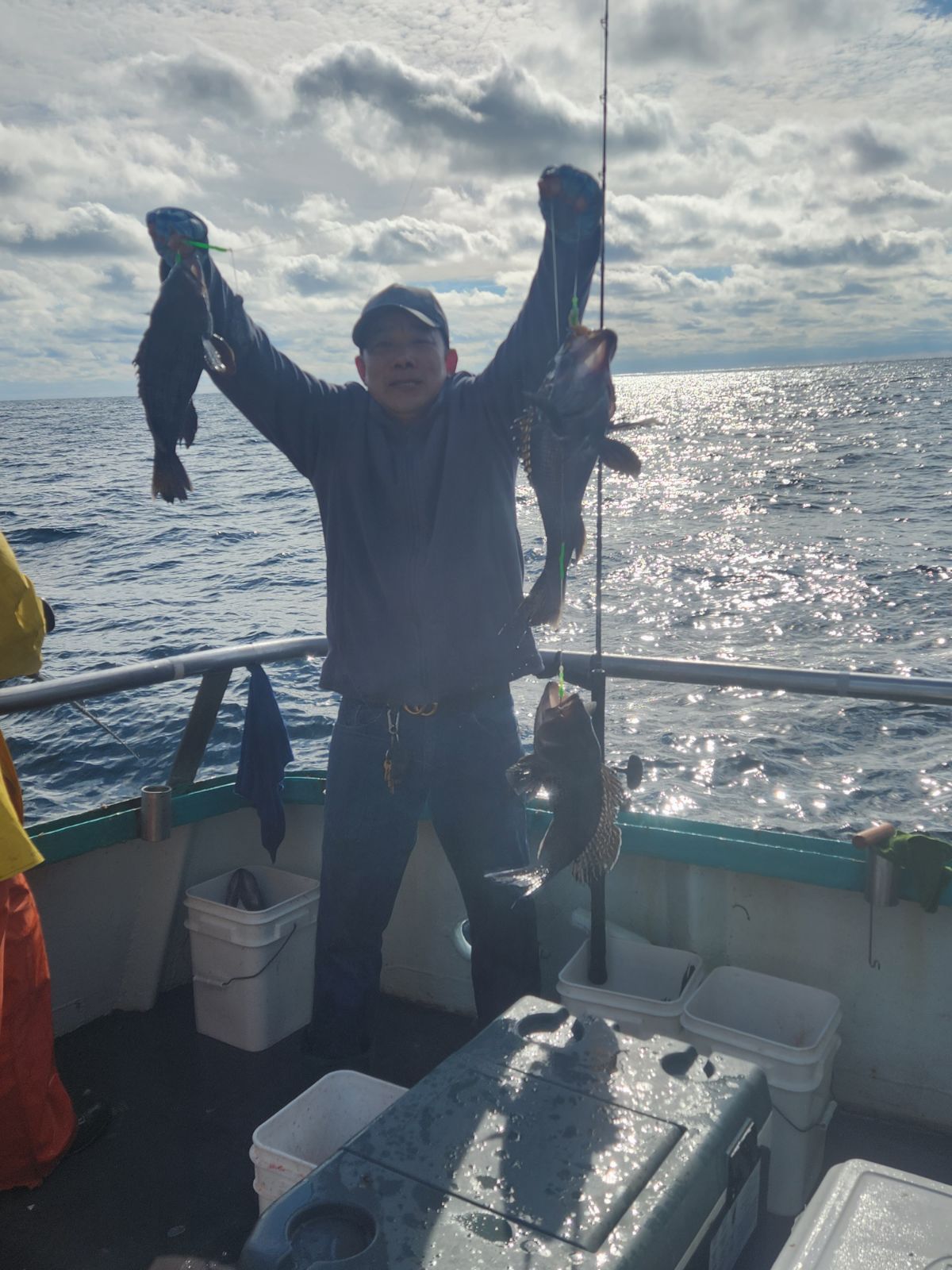 a person standing next to a body of water