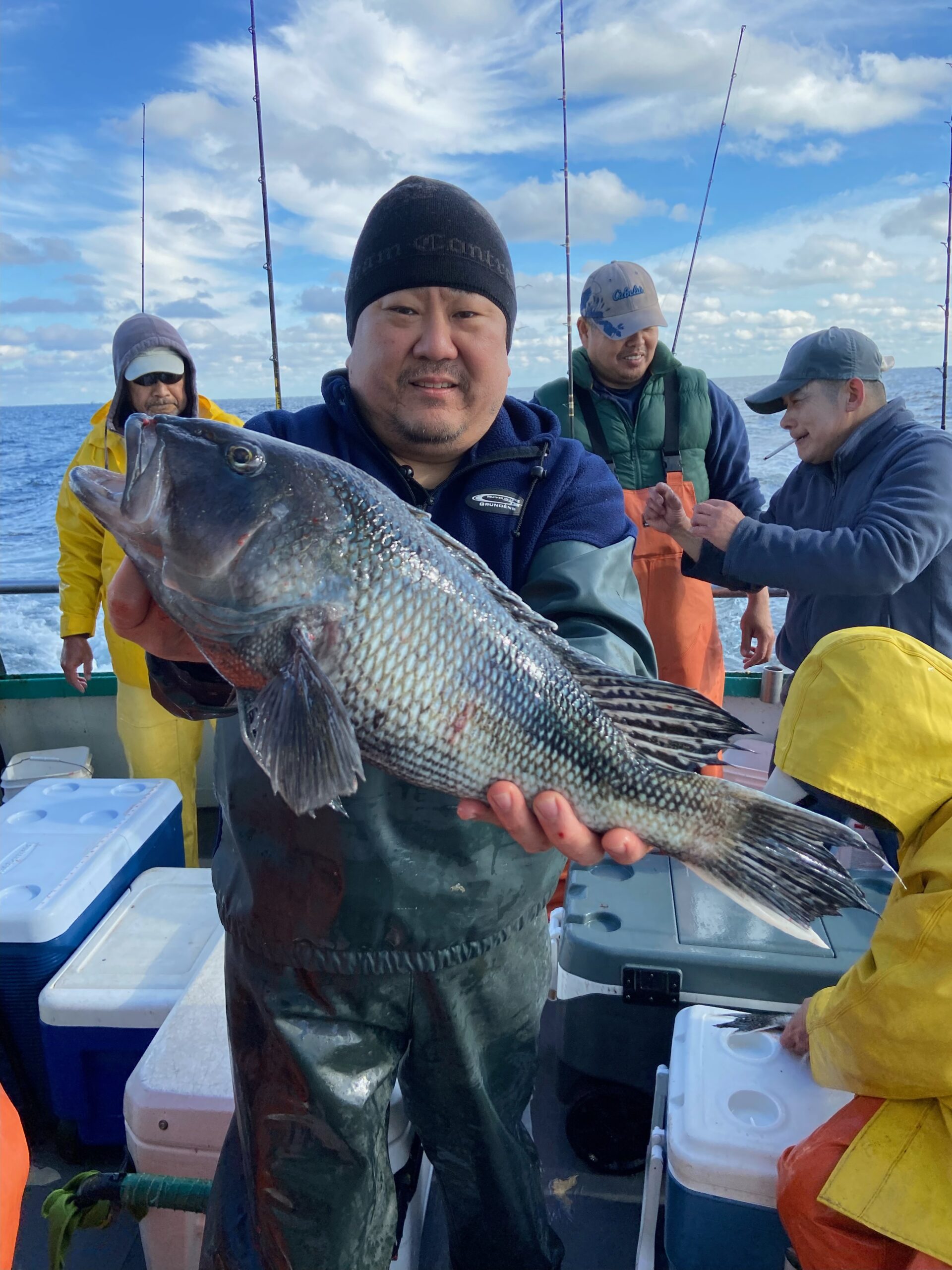 a person holding a fish