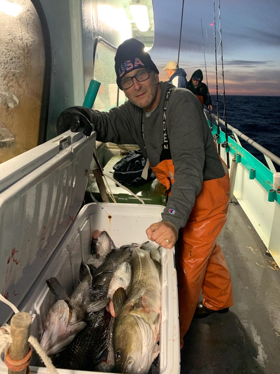 a person holding a fish