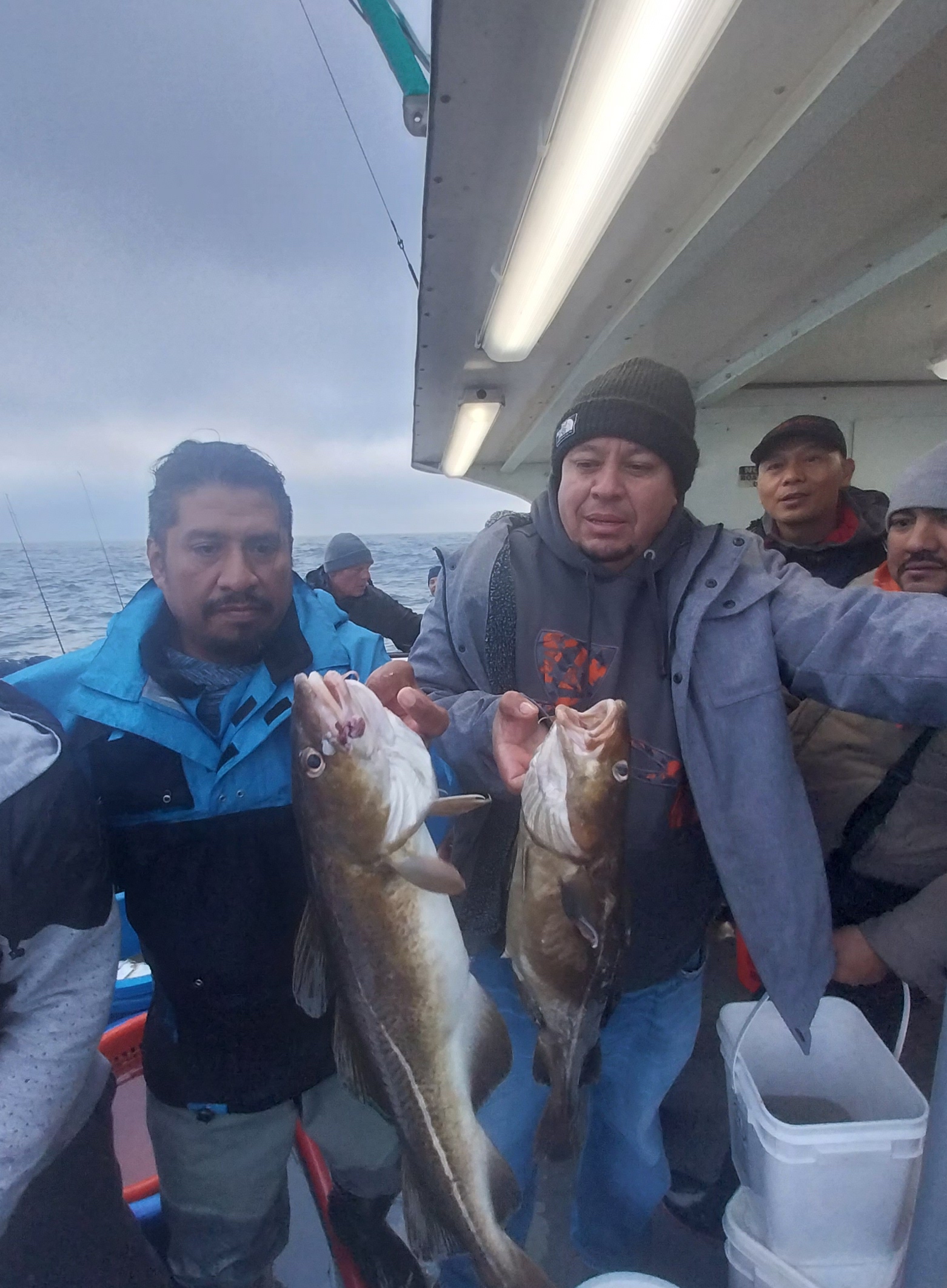 a man holding a fish