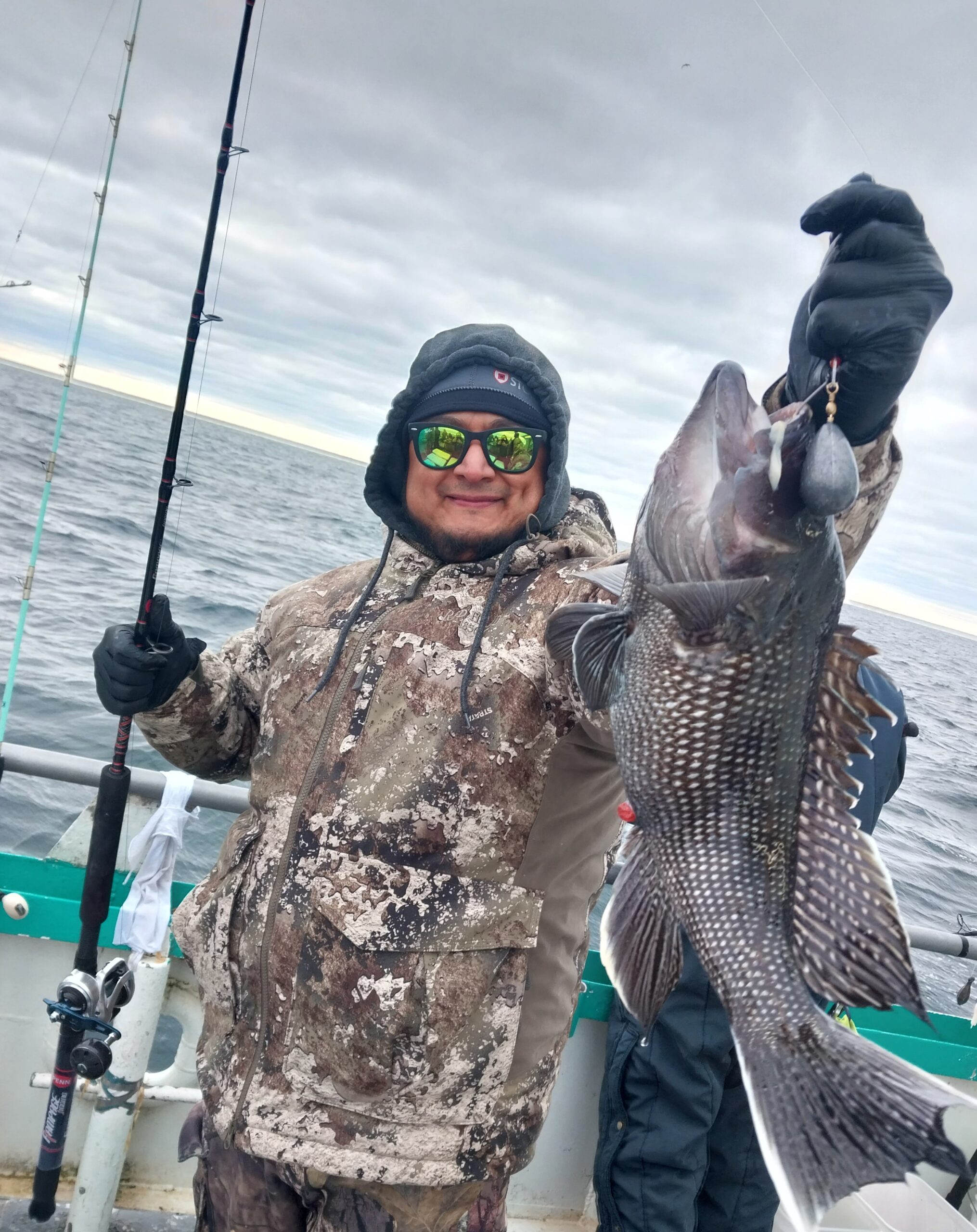 a person holding a fish