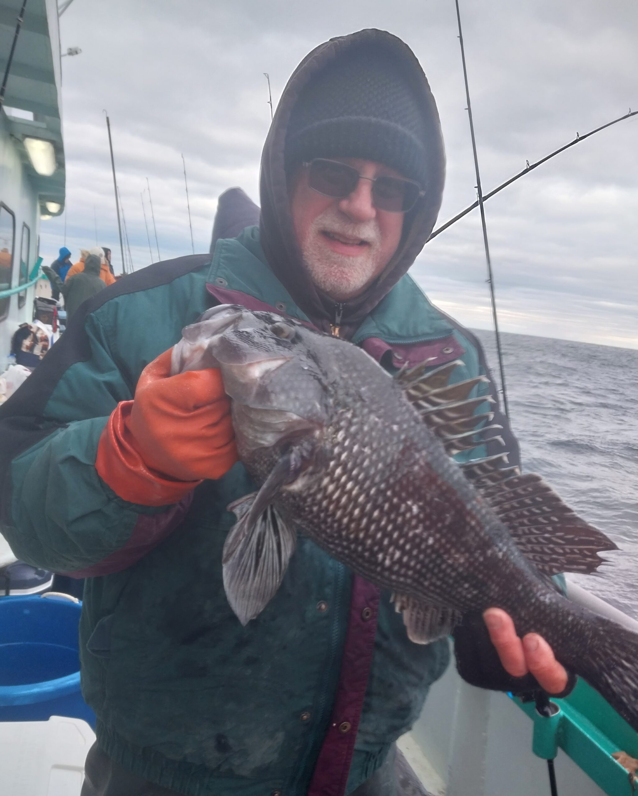 a man holding a fish