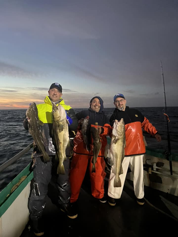 a group of people posing for the camera