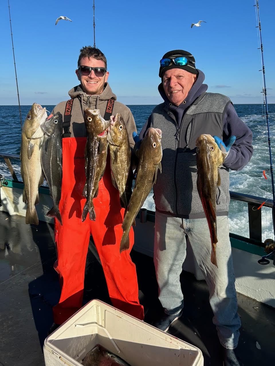 a person holding a fish