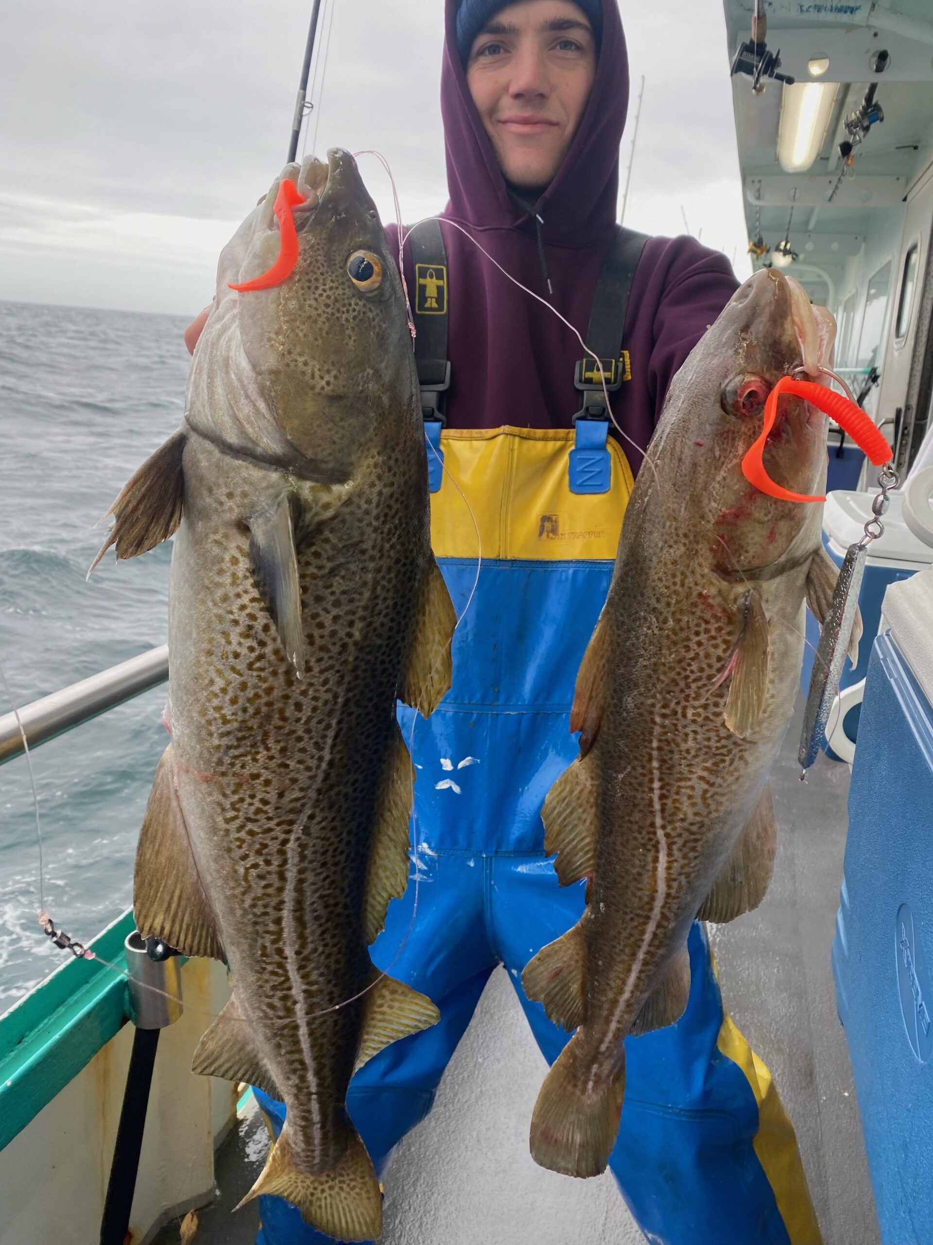 a person holding a fish