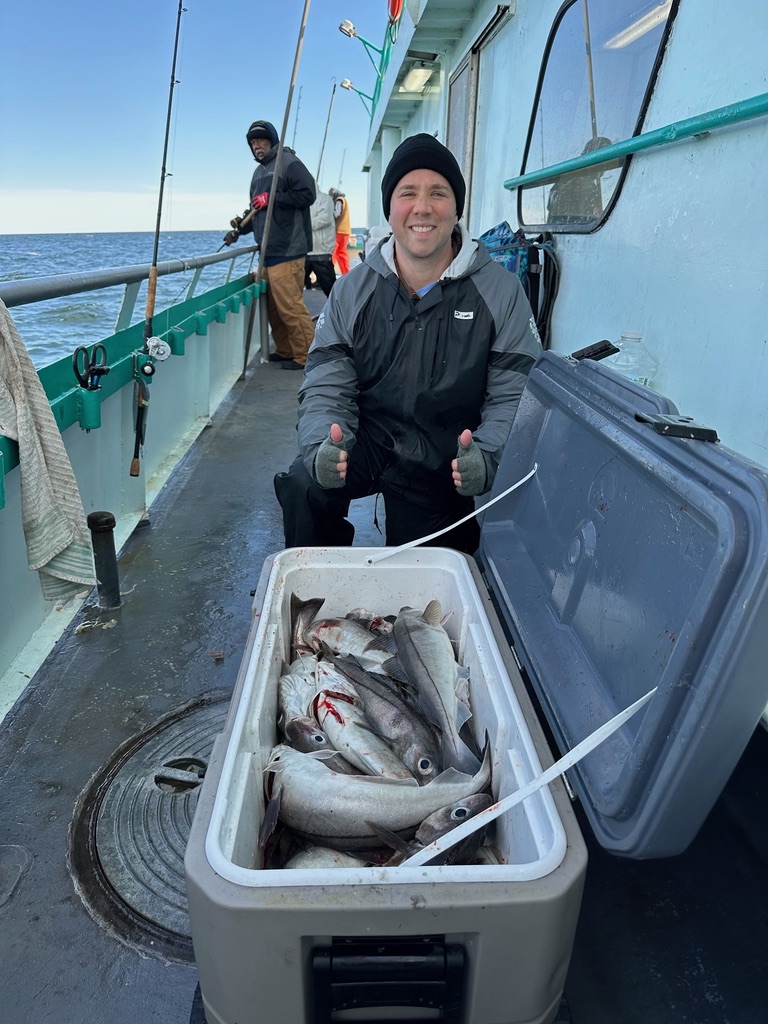 a man standing on a boat