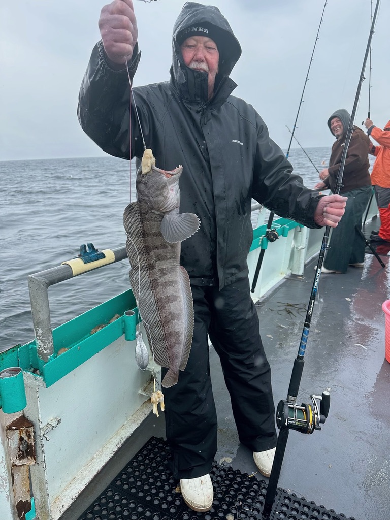 a couple of people that are standing in the snow