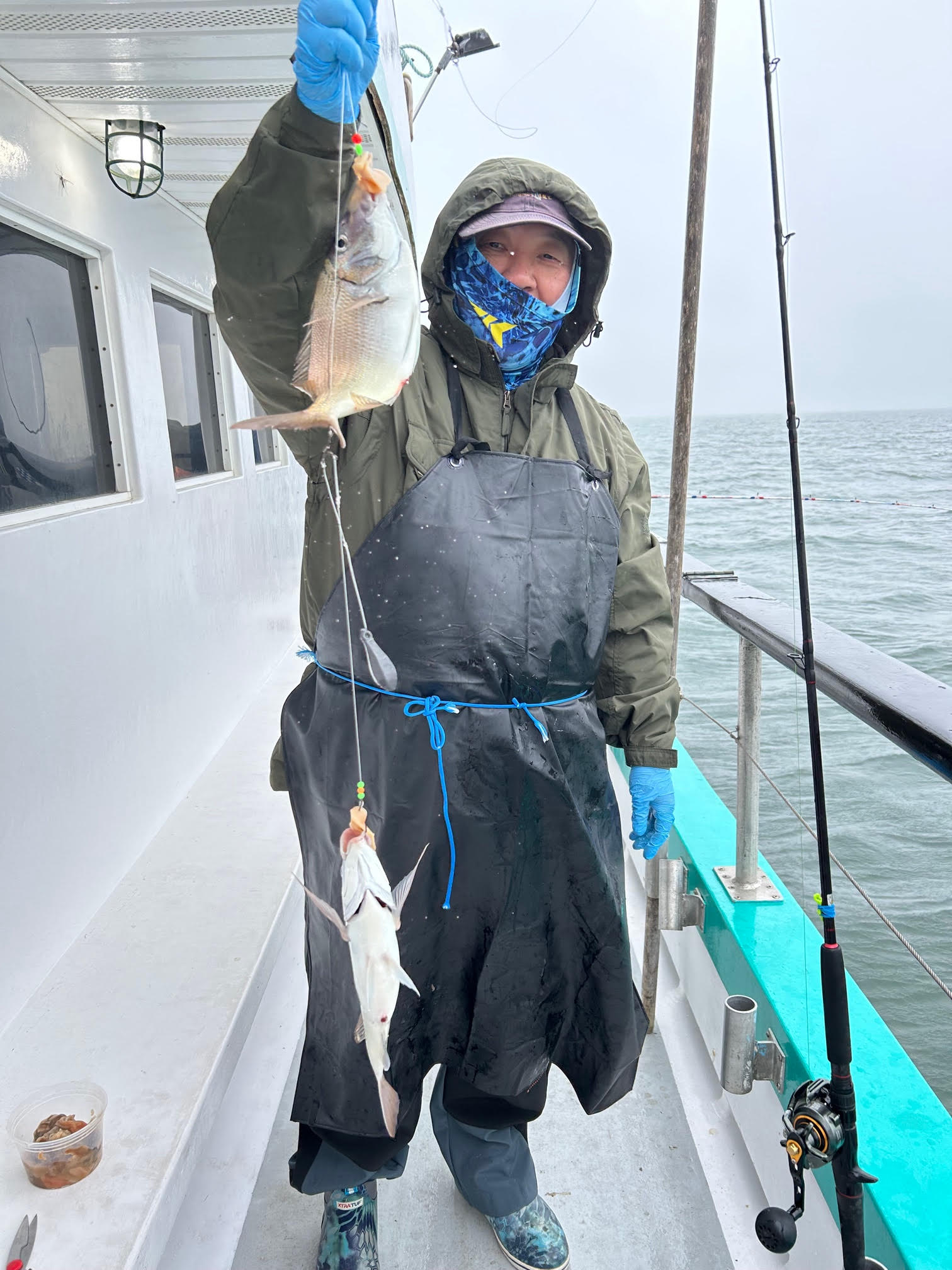 a person standing on a boat in the water
