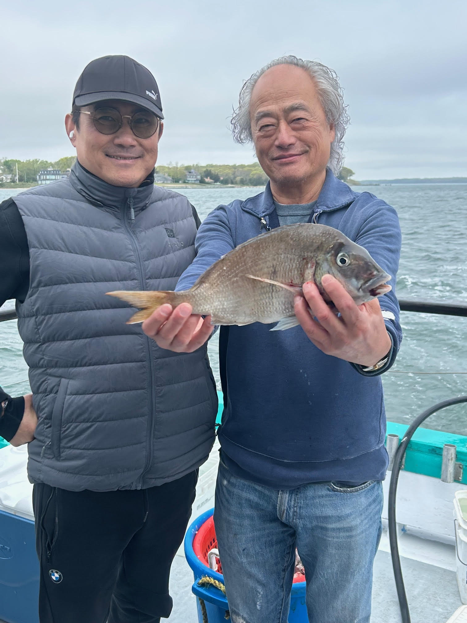 a person holding a fish