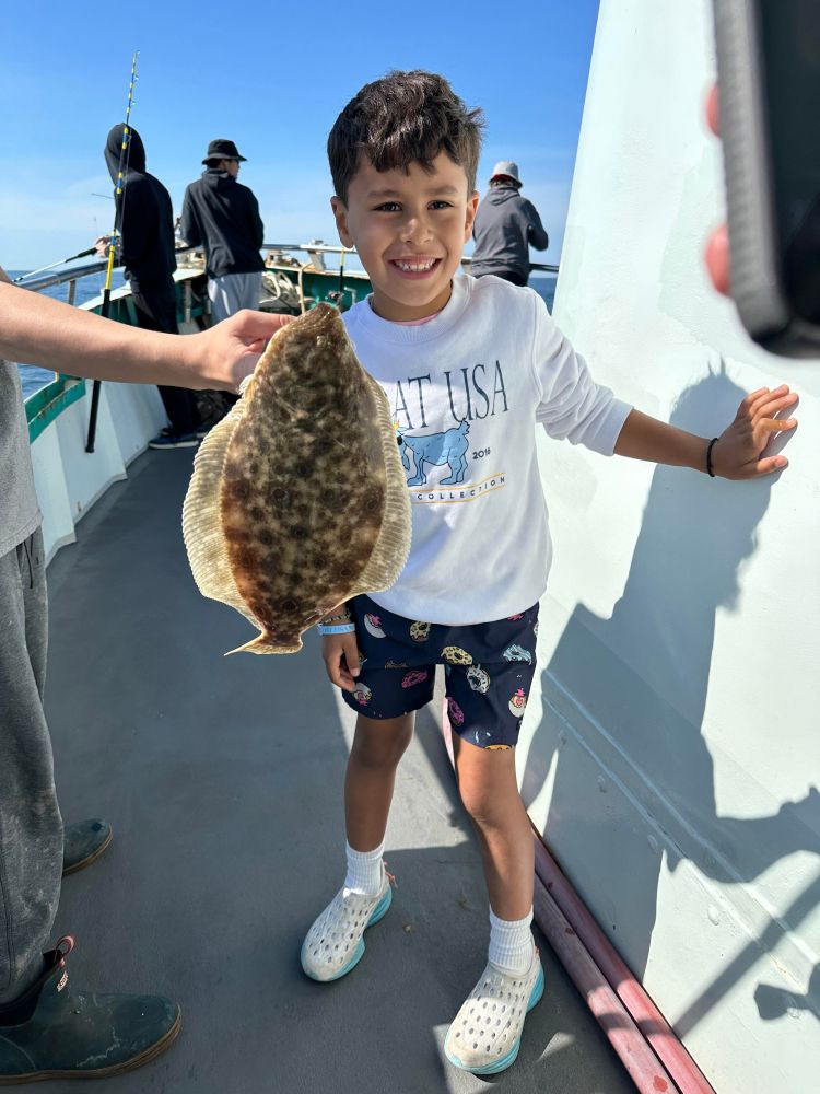 Will Shadley holding a fish