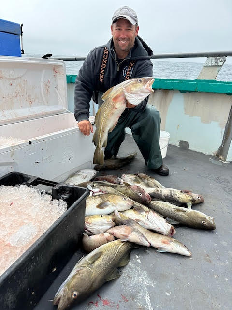 Shane Hall holding a fish