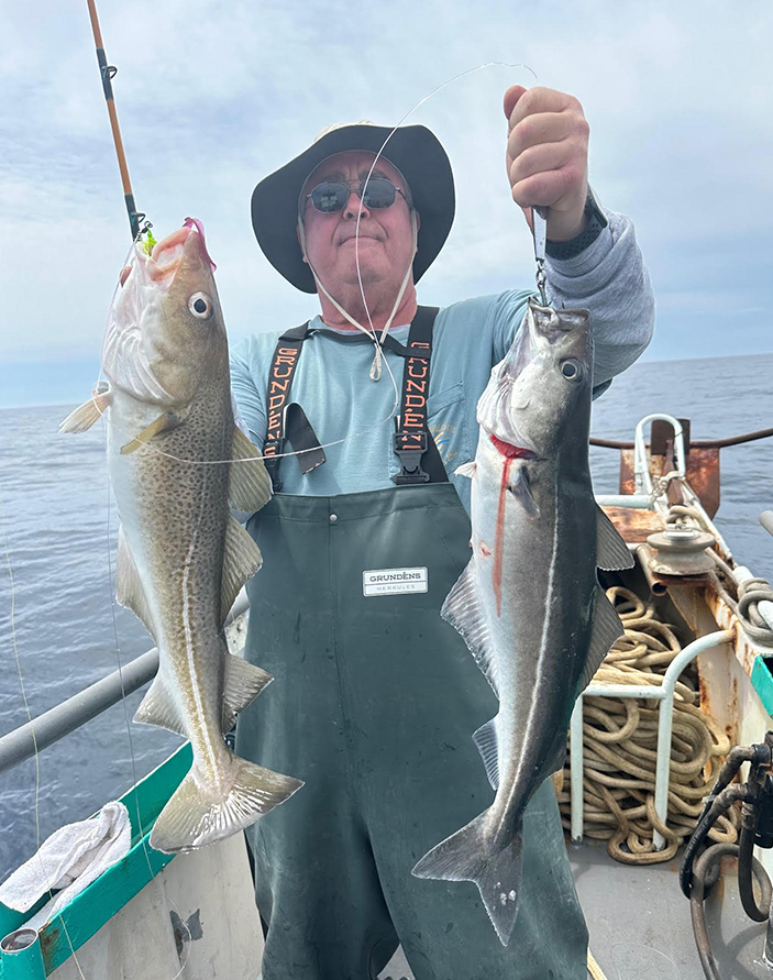 a man holding a fish
