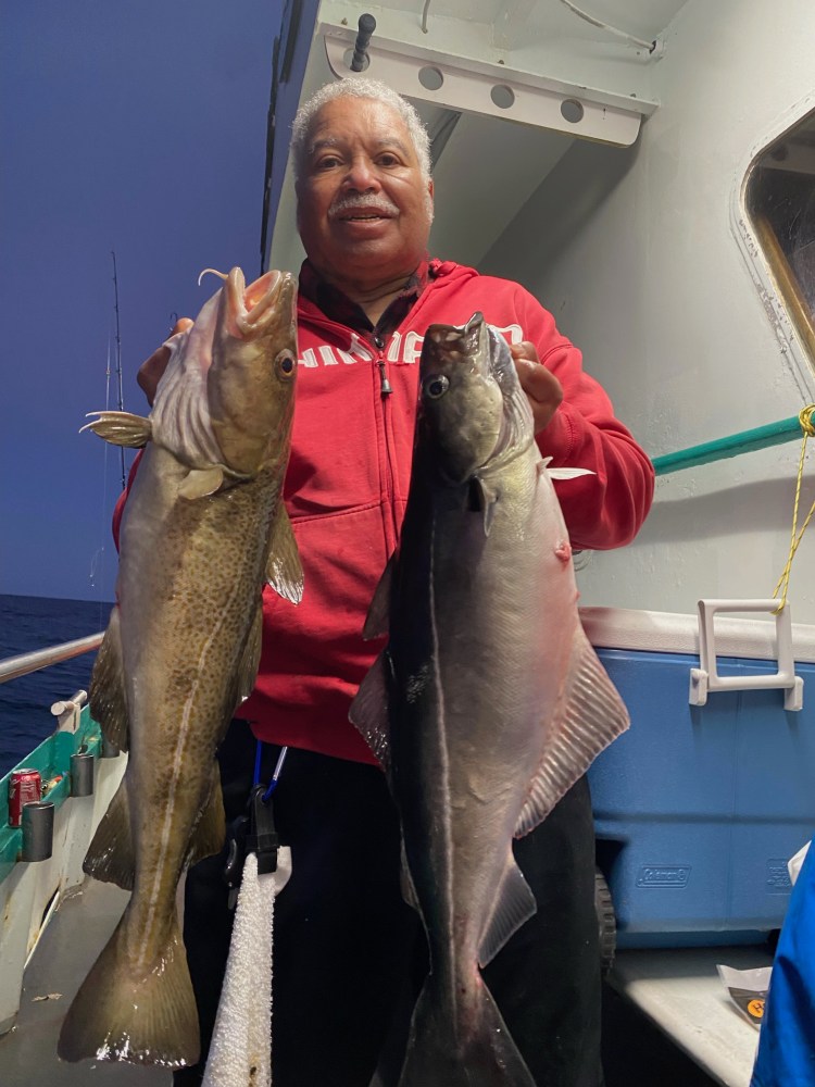 a person holding a fish