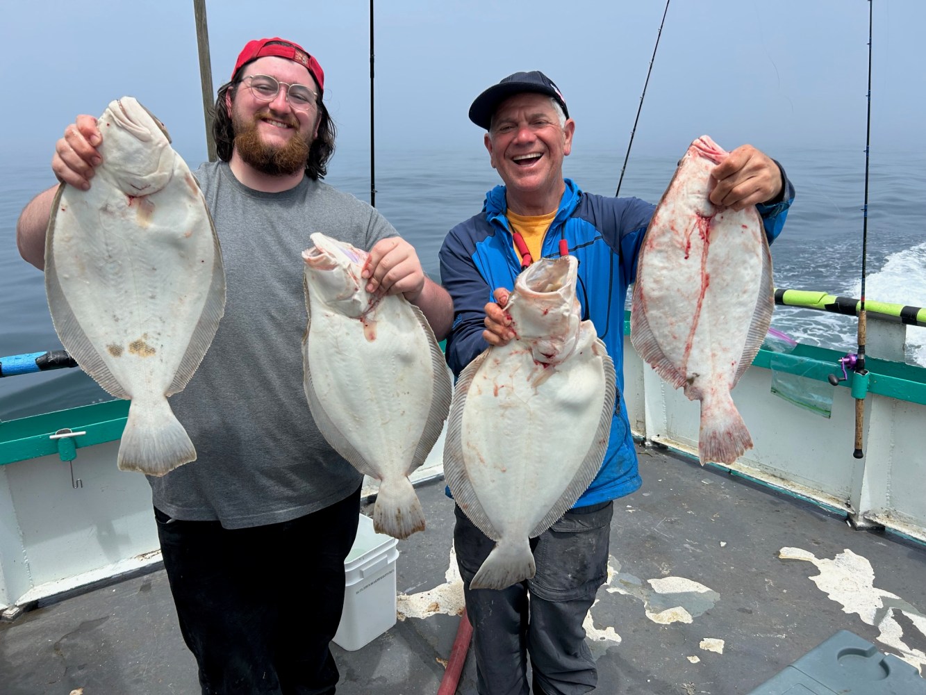 a person holding a fish