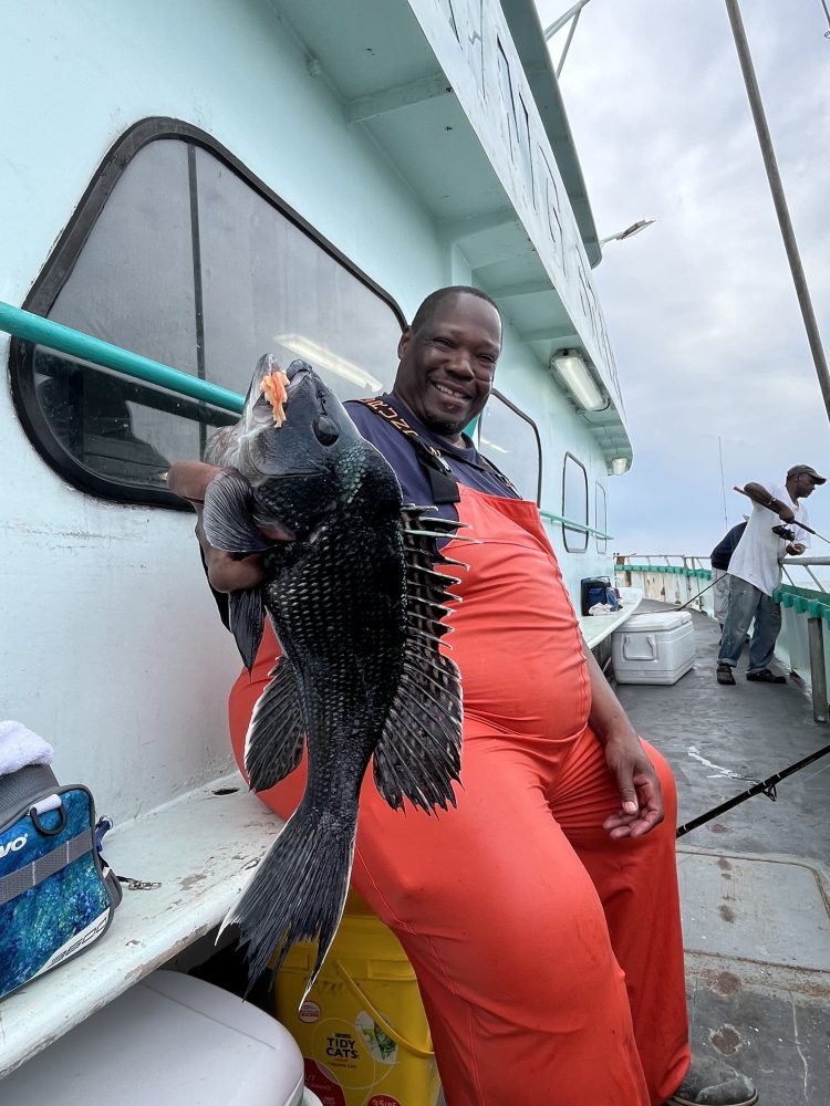 a person standing on a boat