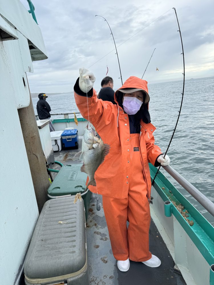 a person standing on a boat in the water