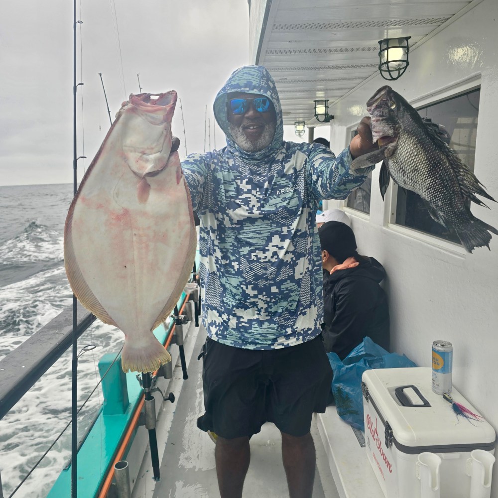 a person holding a fish