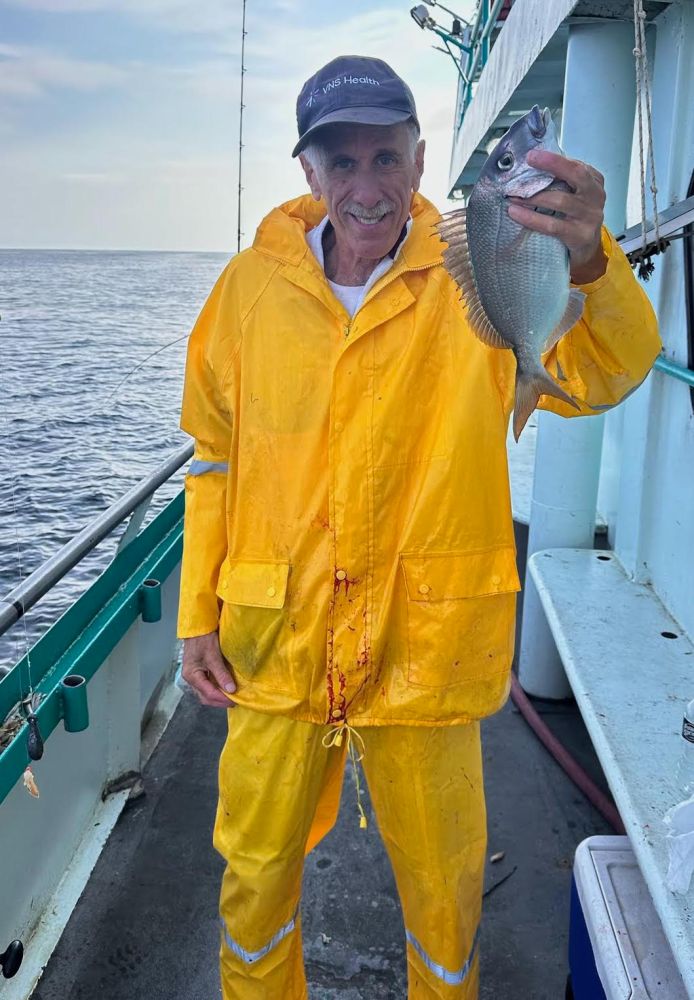 a man standing on a boat