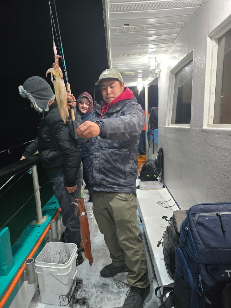 a man holding a piece of luggage