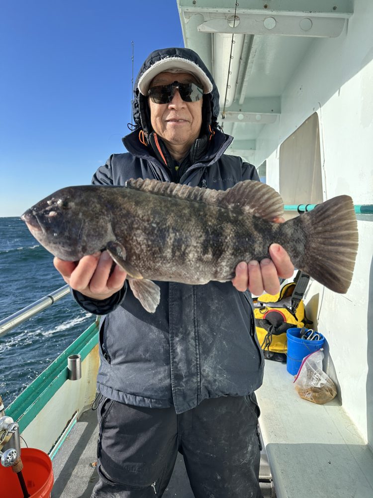 a person holding a fish