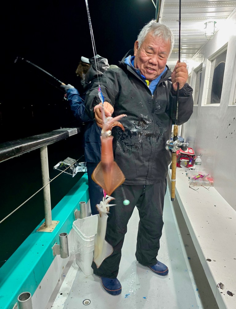 a person in a blue uniform holding a gun