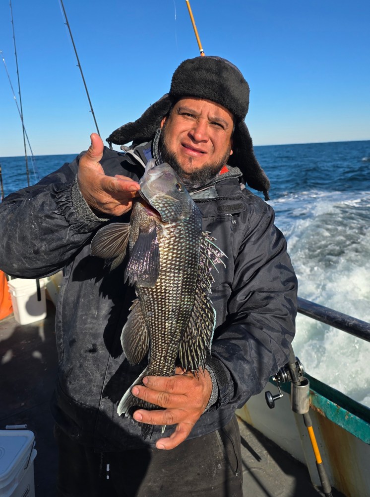 Duminda Silva holding a fish