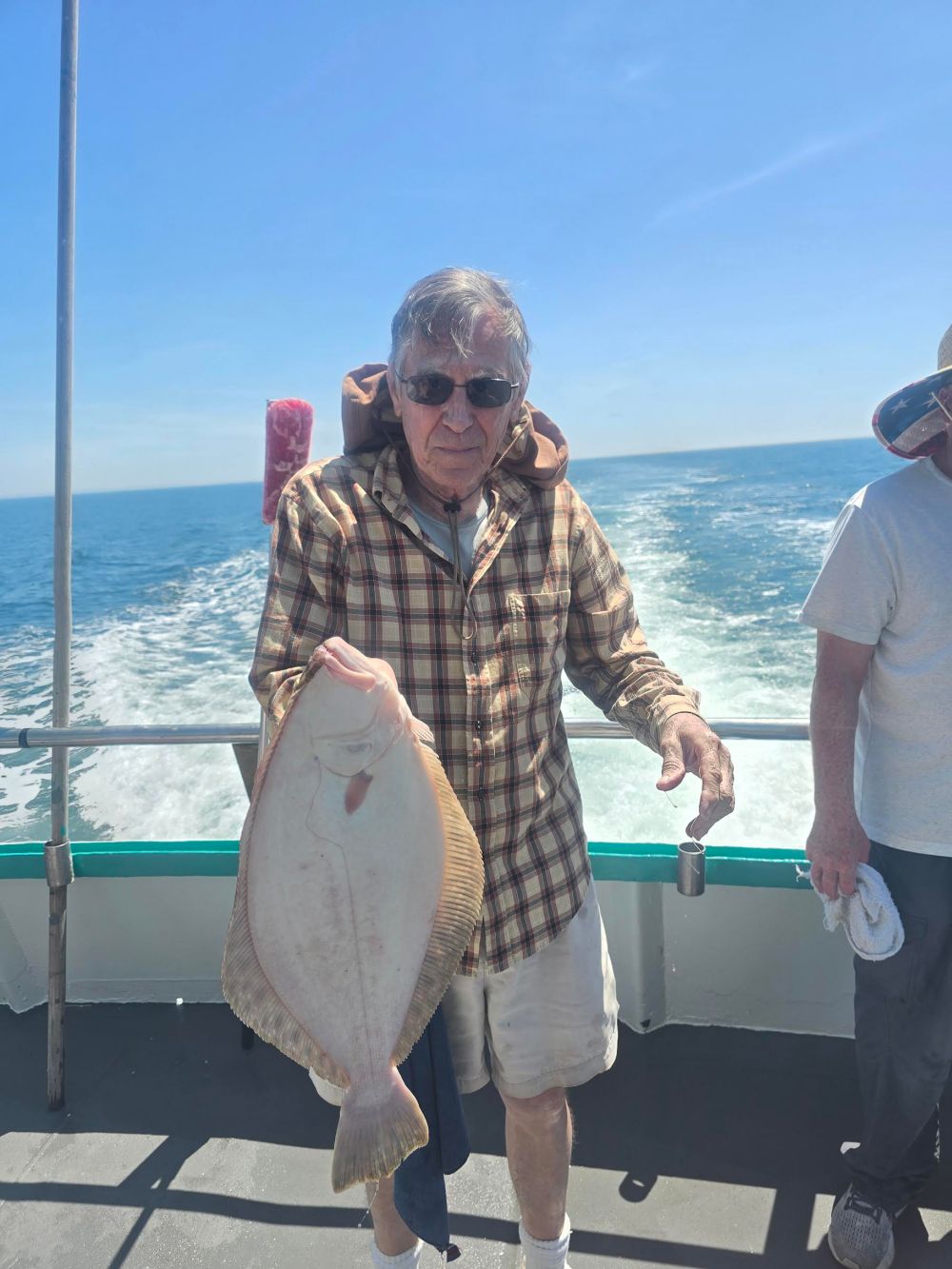 a couple of people that are standing in the water