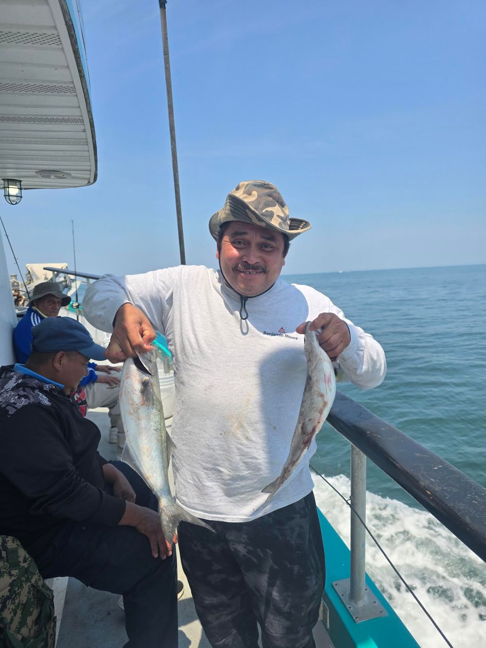 a couple of people that are standing in the water