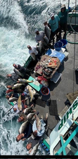 a group of people on a boat