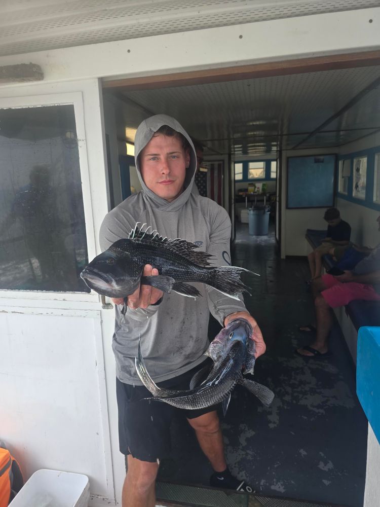 a man standing in front of a building