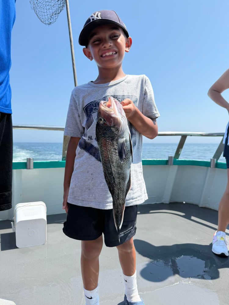 a man and a woman standing on a beach