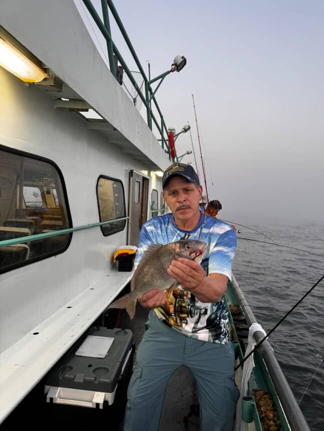 Marco Morandi sitting on a boat