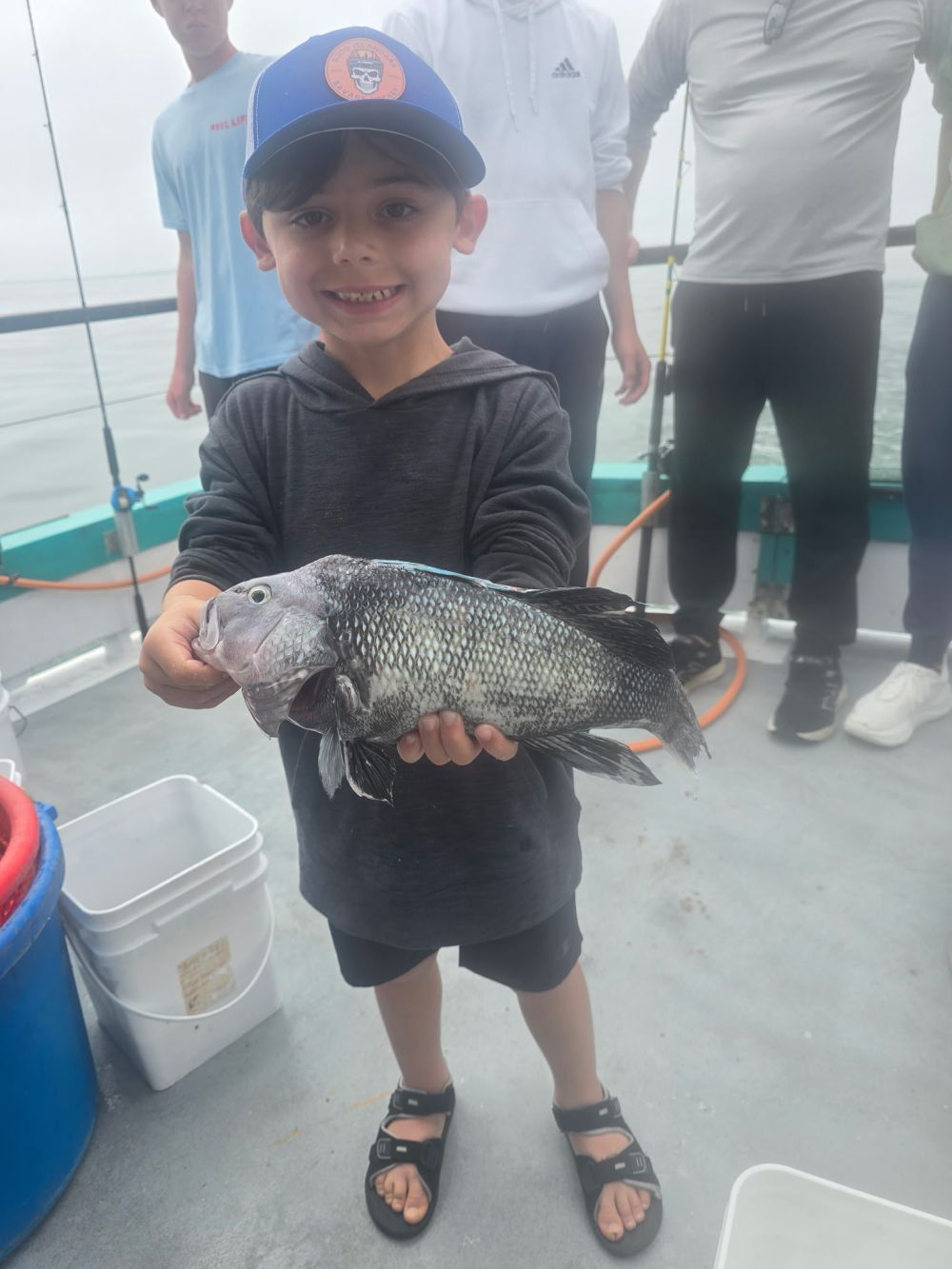 a person holding a fish