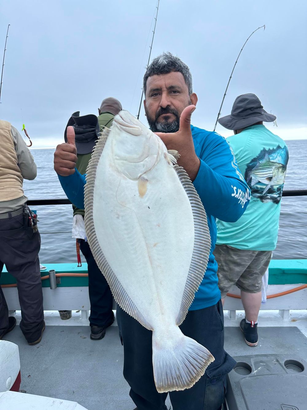 Tompall Glaser holding a fish