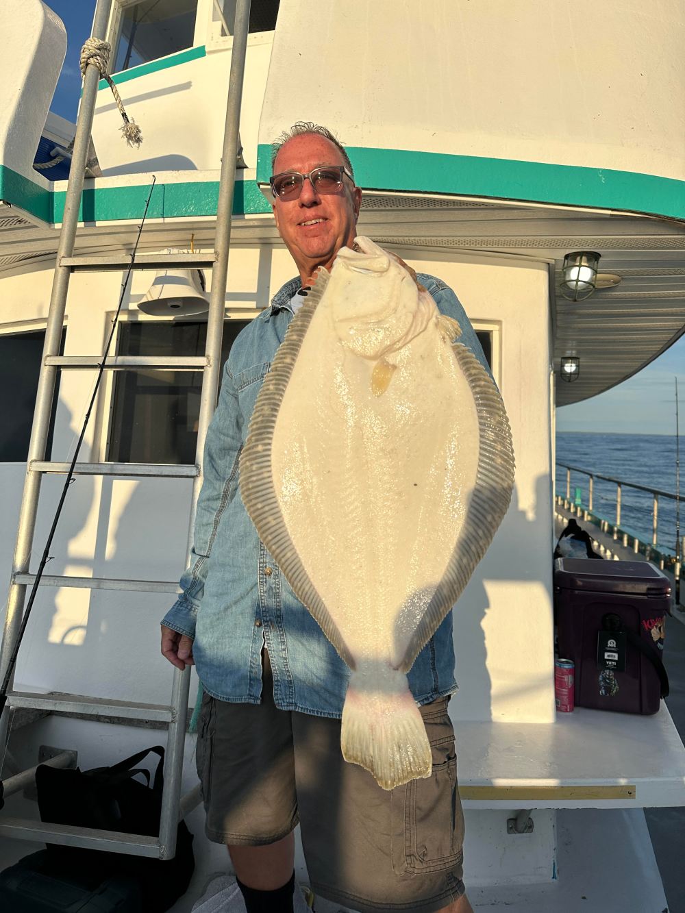 a person standing in front of a car