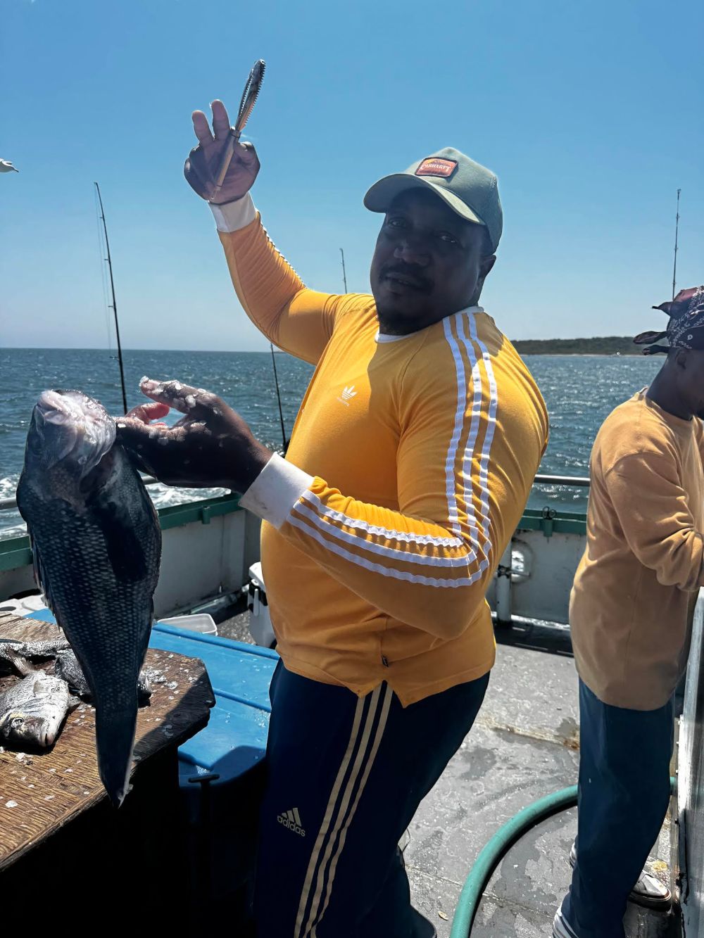 a couple of people that are standing in a body of water
