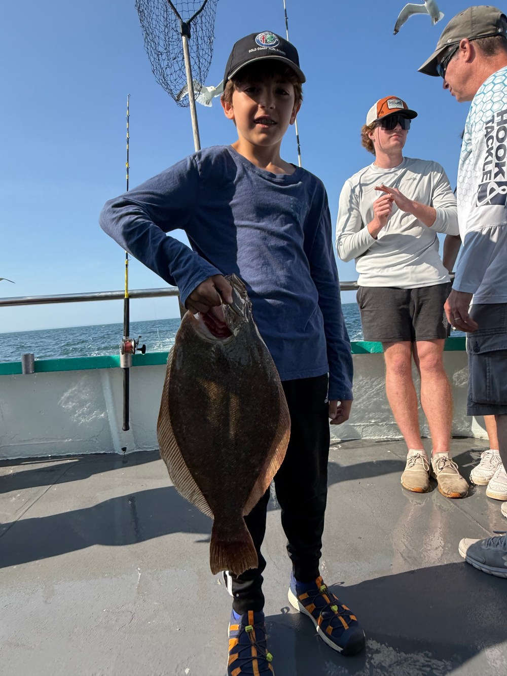 a group of people on a sidewalk
