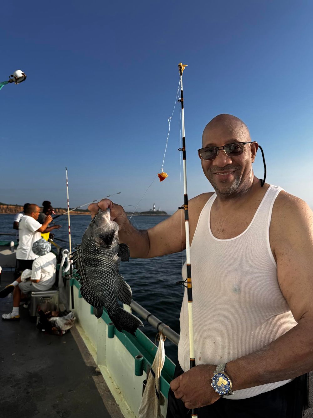a group of people standing in a parking lot