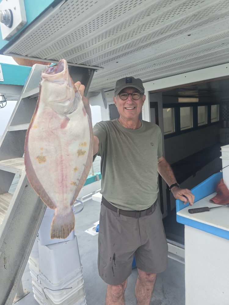 Alastair Galpin holding a fish
