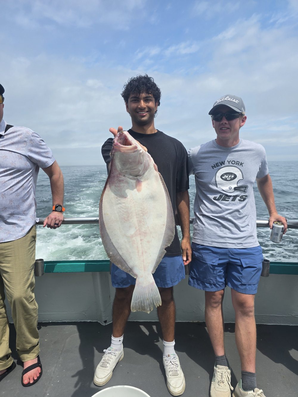 a man holding a fish