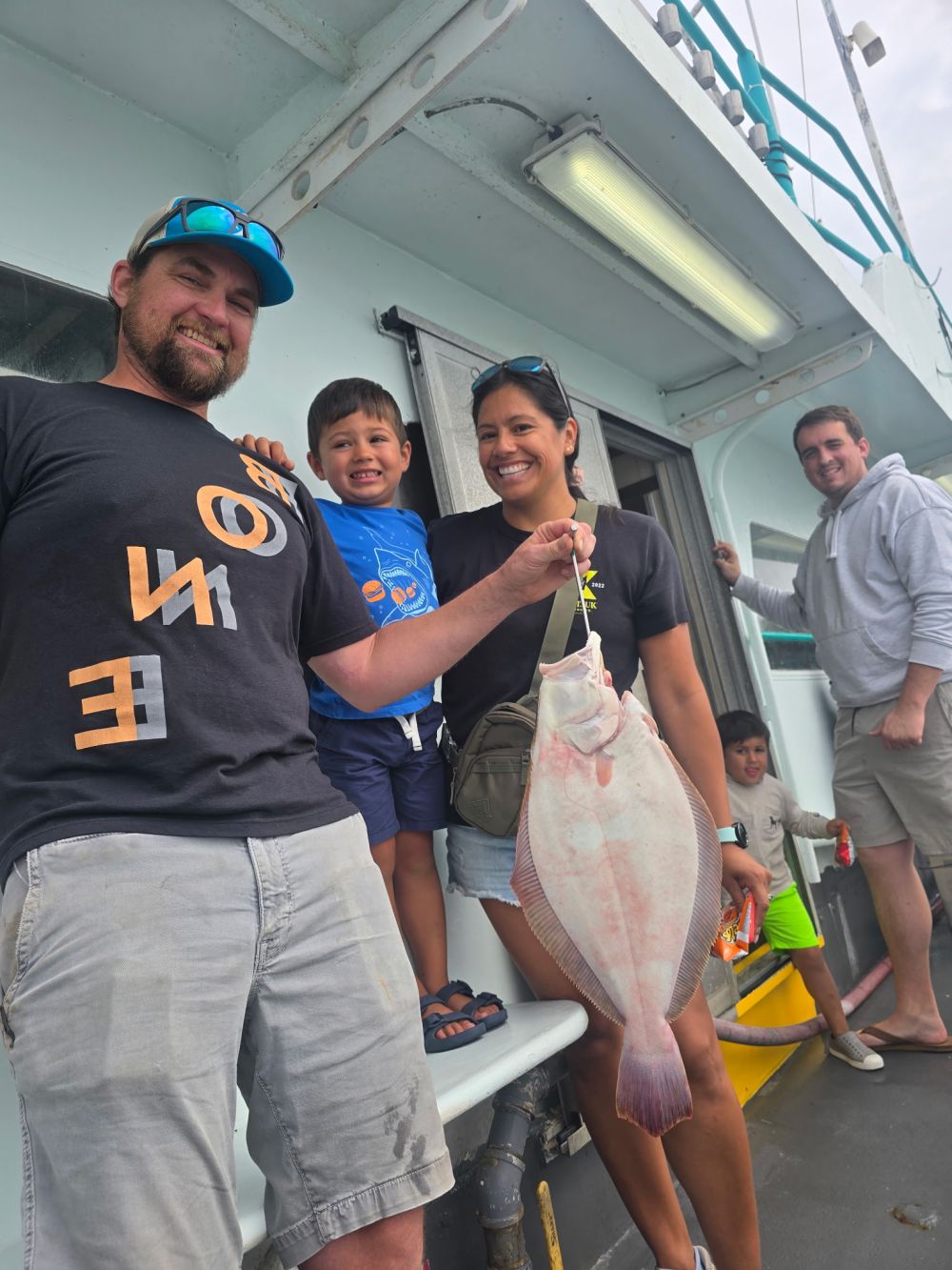 a man holding a fish
